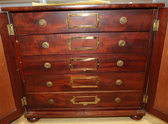 A collectors chest containing various eyes